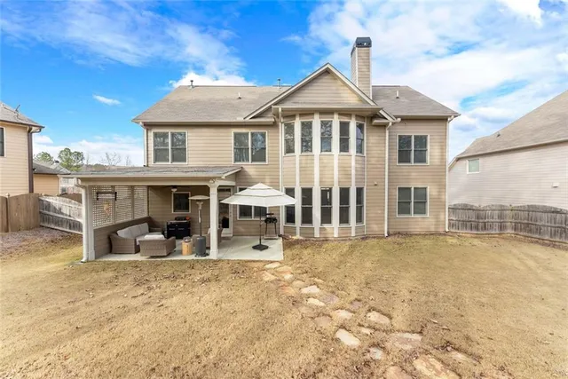 an aerial view of a building with outdoor space