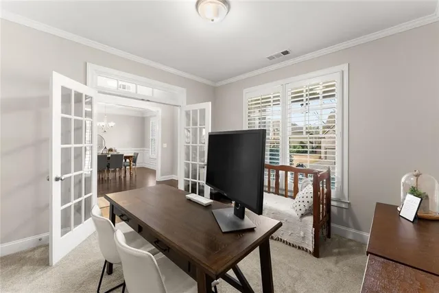 a workspace with furniture and window