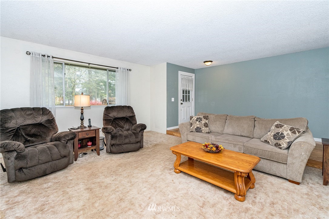 180 Winter Road Winlock, WA 98596 - Photo 3 of 40 a living room with furniture and a large window