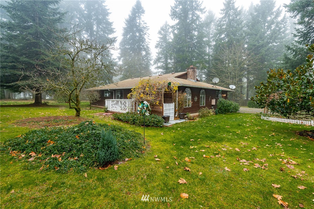 180 Winter Road Winlock, WA 98596 - Photo 28 of 40 a view of a house with a big yard plants and large trees