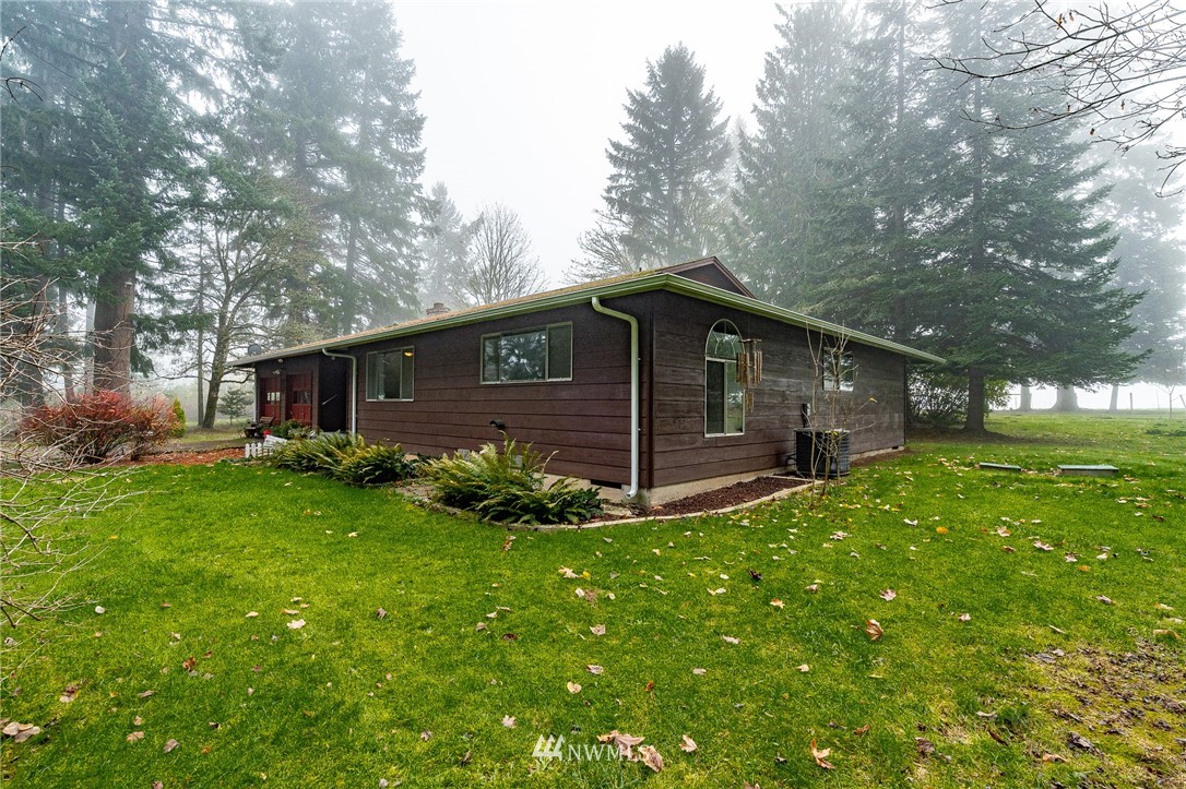 180 Winter Road Winlock, WA 98596 - Photo 32 of 40 a front view of house with yard and green space