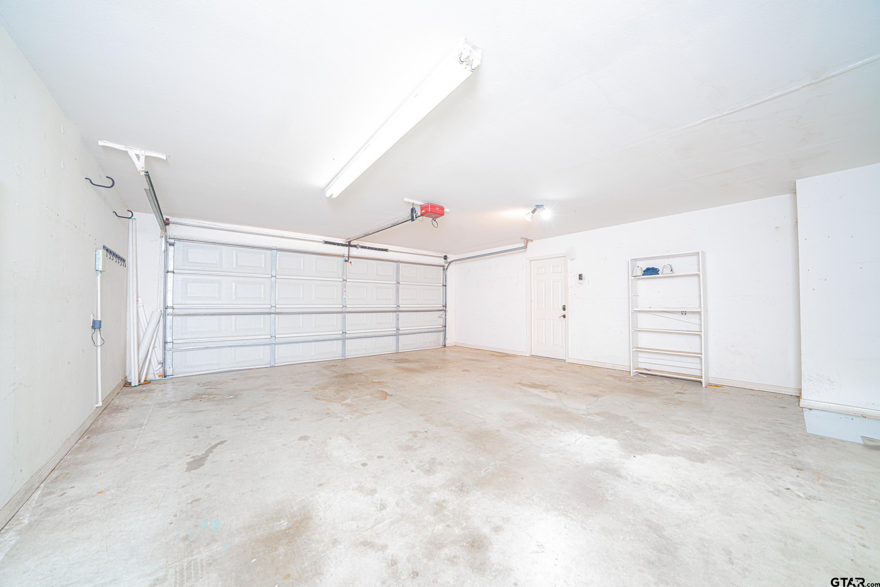 1704 West Northwood Court Longview, TX 75605 - Photo 17 of 32 a view of a garage
