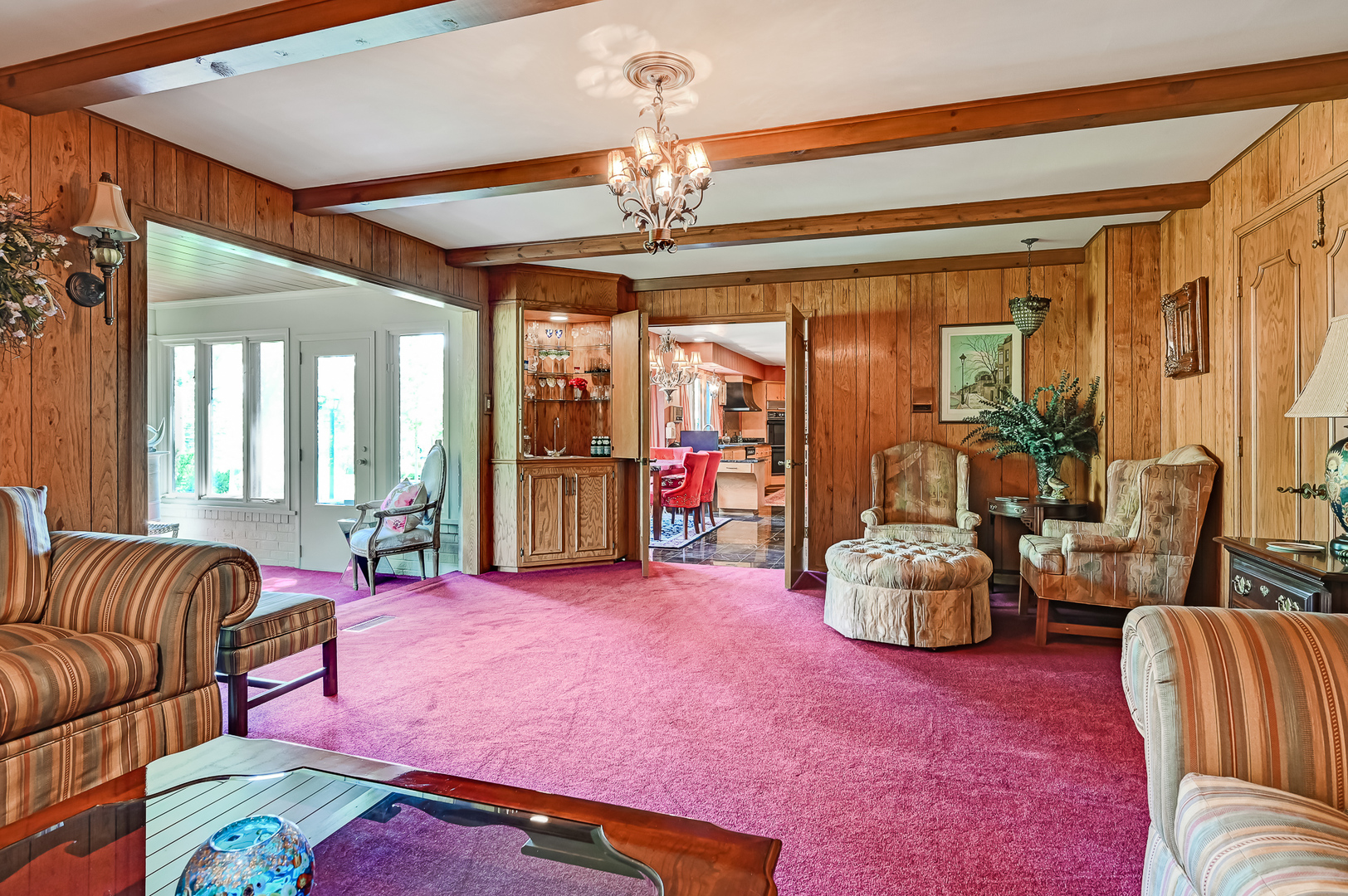 107 Stirrup Lane Burr Ridge, IL 60527 - Photo 17 of 37 a bedroom with furniture and a chandelier