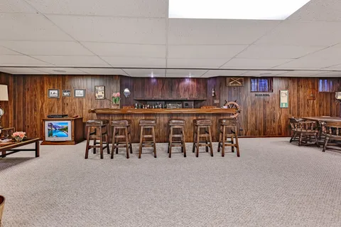 a view of a chairs and table in a room