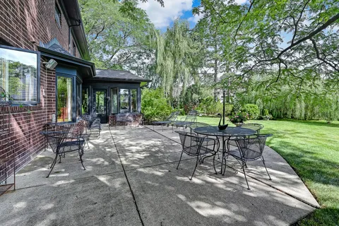 a view of a backyard with a garden
