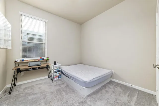 a bathroom with a double vanity sink and mirror