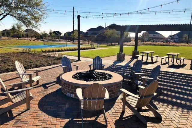 a view of a terrace with outdoor seating