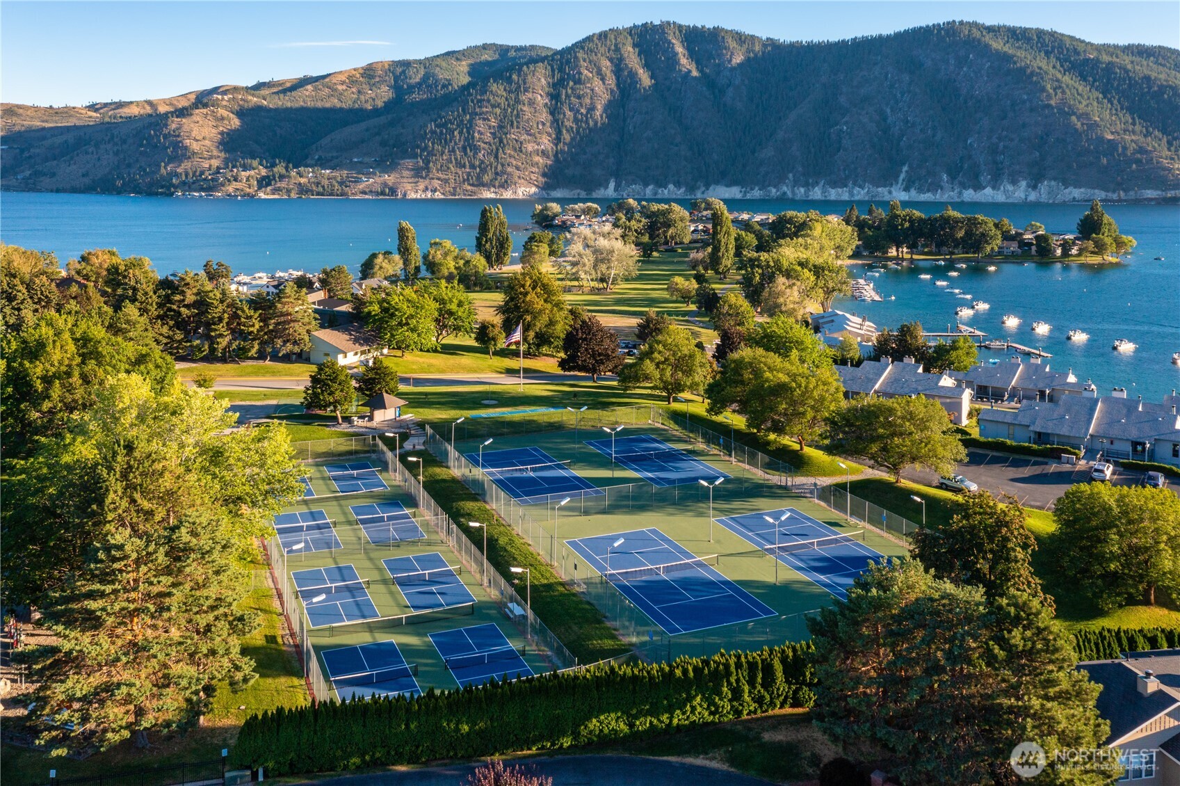 1 Lakeside 708-k Manson, WA 98831 - Photo 17 of 37 a view of a swimming pool with an outdoor seating