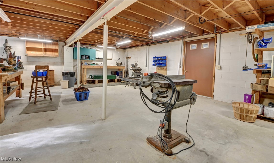 14965 Seacrist Road Salem, OH 44460 - Photo 22 of 43 Unfinished below grade area with a workshop area