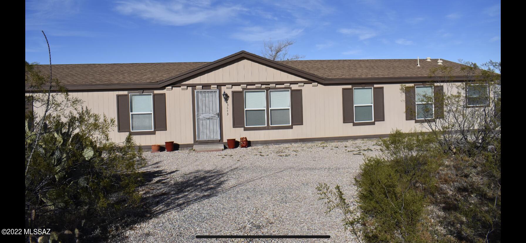 13643 East Bright Sky Loop Vail, AZ 85641 - Photo 2 of 22 front view of a house