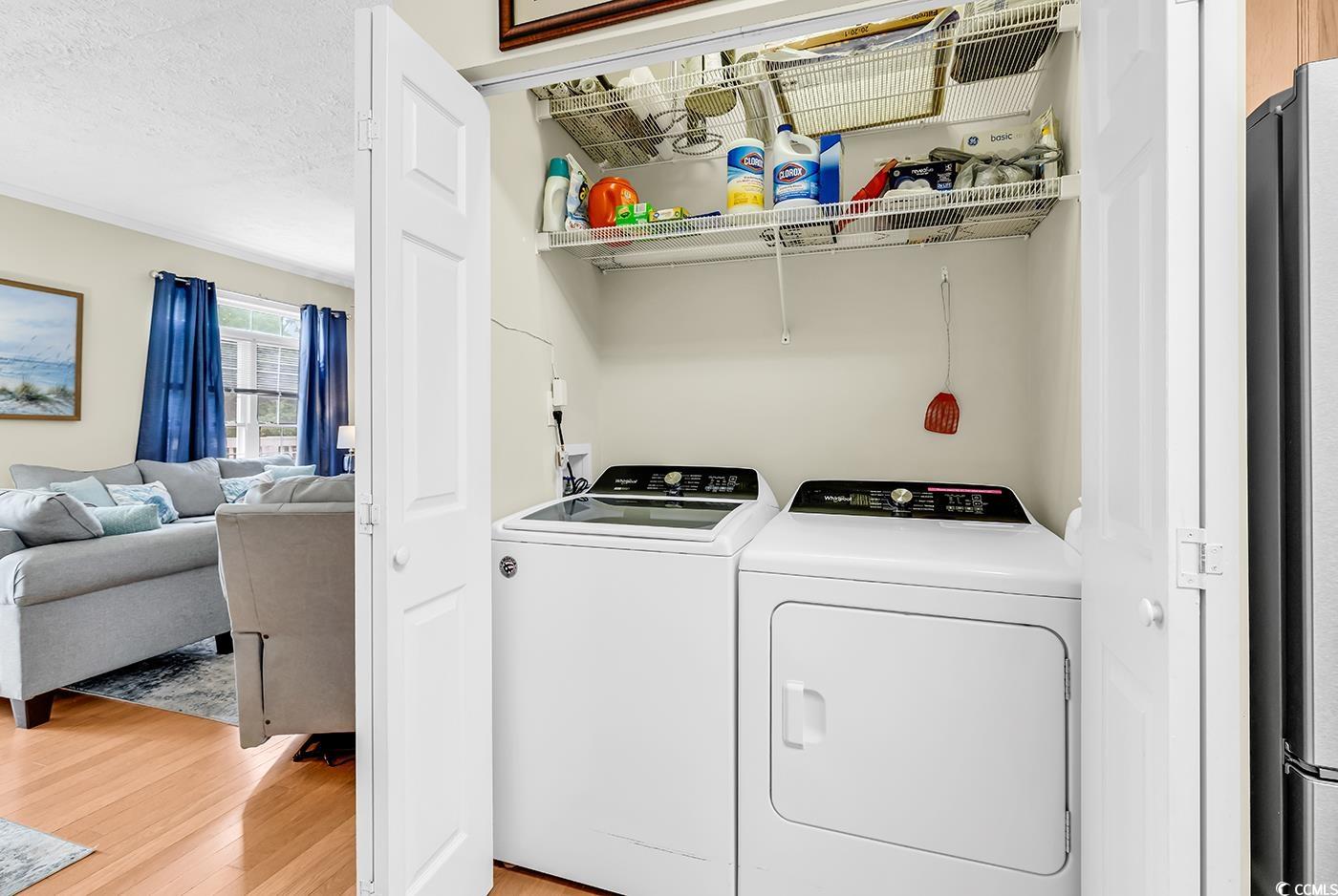 17 South Oak Drive Surfside Beach, SC 29575 - Photo 16 of 38 Washroom featuring washer and dryer and light wood-style floors