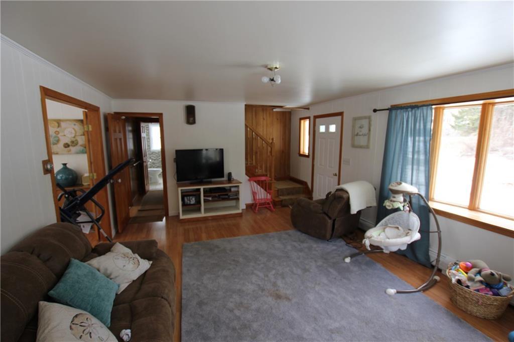 270 Sunset Road Deer Isle, ME 04627 - Photo 11 of 28 Living room looking towards stairs