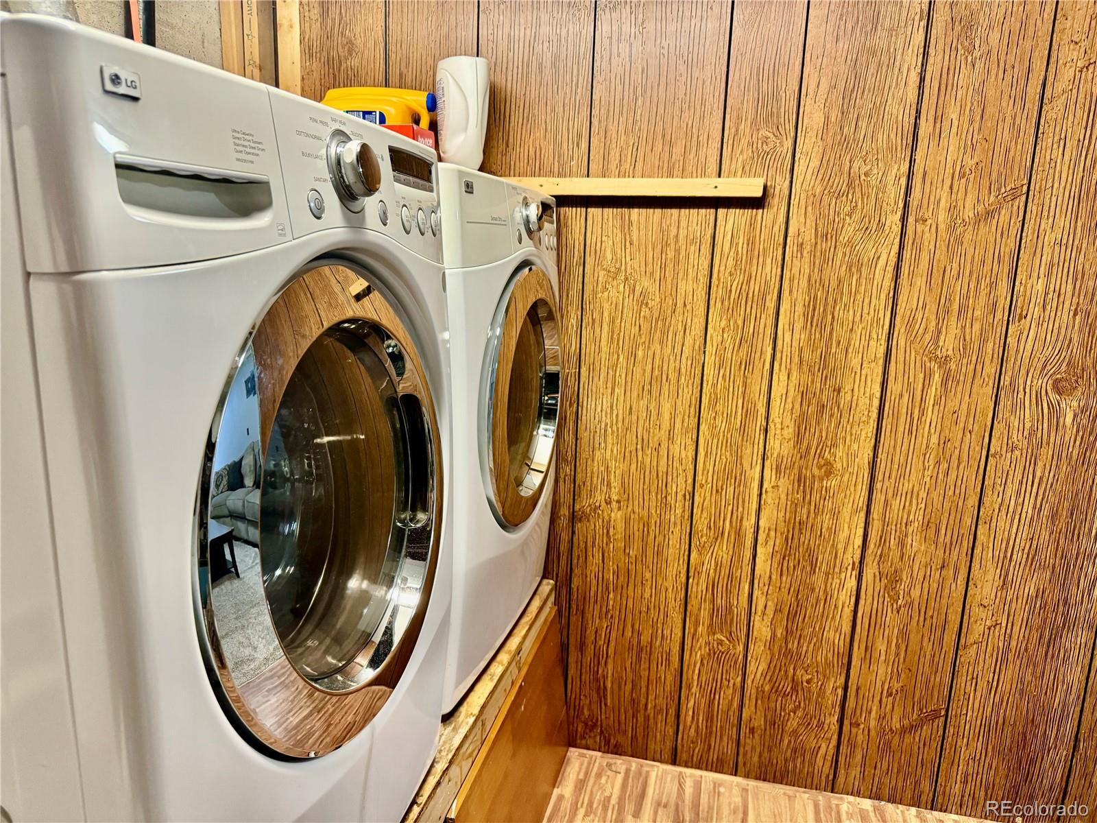 1254 South Reed Street, Unit 1 Lakewood, CO 80232 - Photo 17 of 19 a utility room with dryer and washer