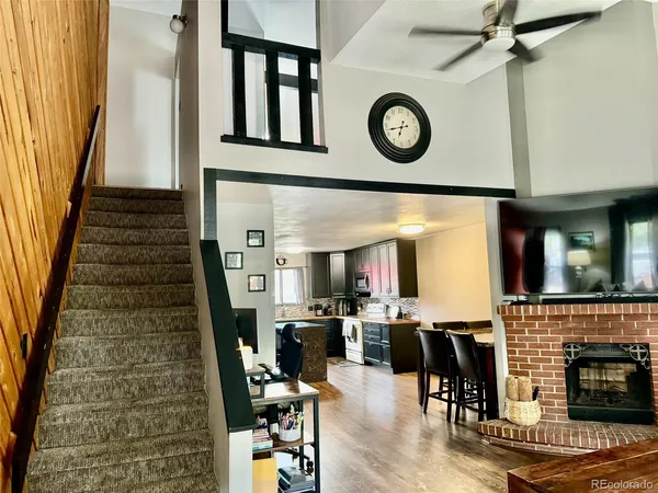 a view of a hallway with seating area