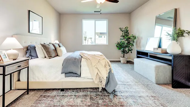 a living room with a balcony furniture and a chandelier