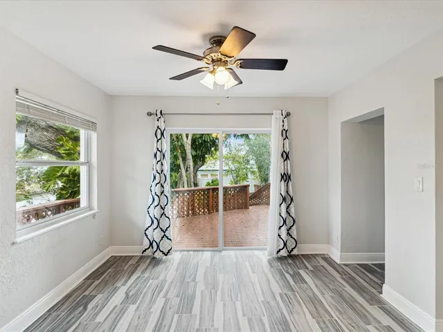 a kitchen with stainless steel appliances a refrigerator sink and microwave