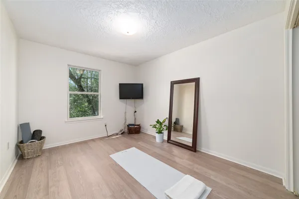 a view of livingroom with furniture and flat screen tv