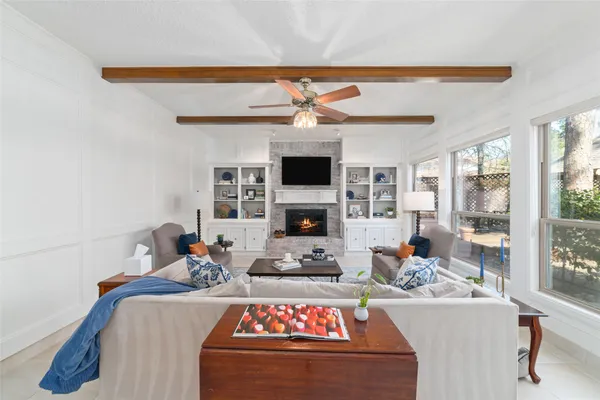 a living room with a couch and a flat screen tv