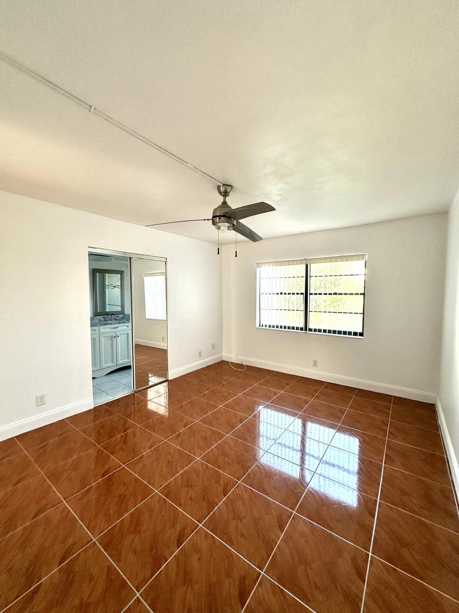 9235 Southwest 8th Street, Unit 306 Boca Raton, FL 33428 - Photo 13 of 27 Primary Bedroom