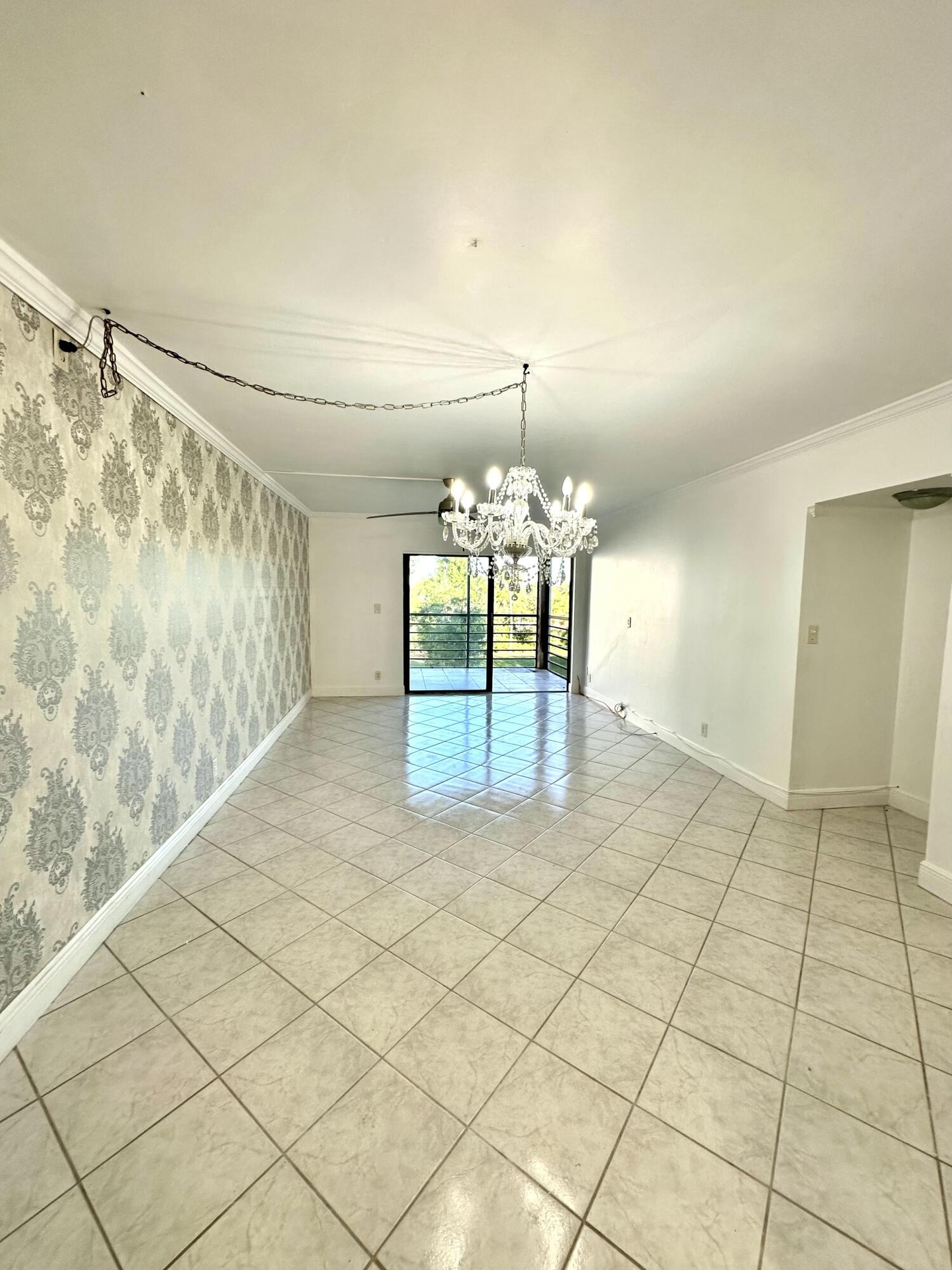 9235 Southwest 8th Street, Unit 306 Boca Raton, FL 33428 - Photo 5 of 27 Dining / Living Room