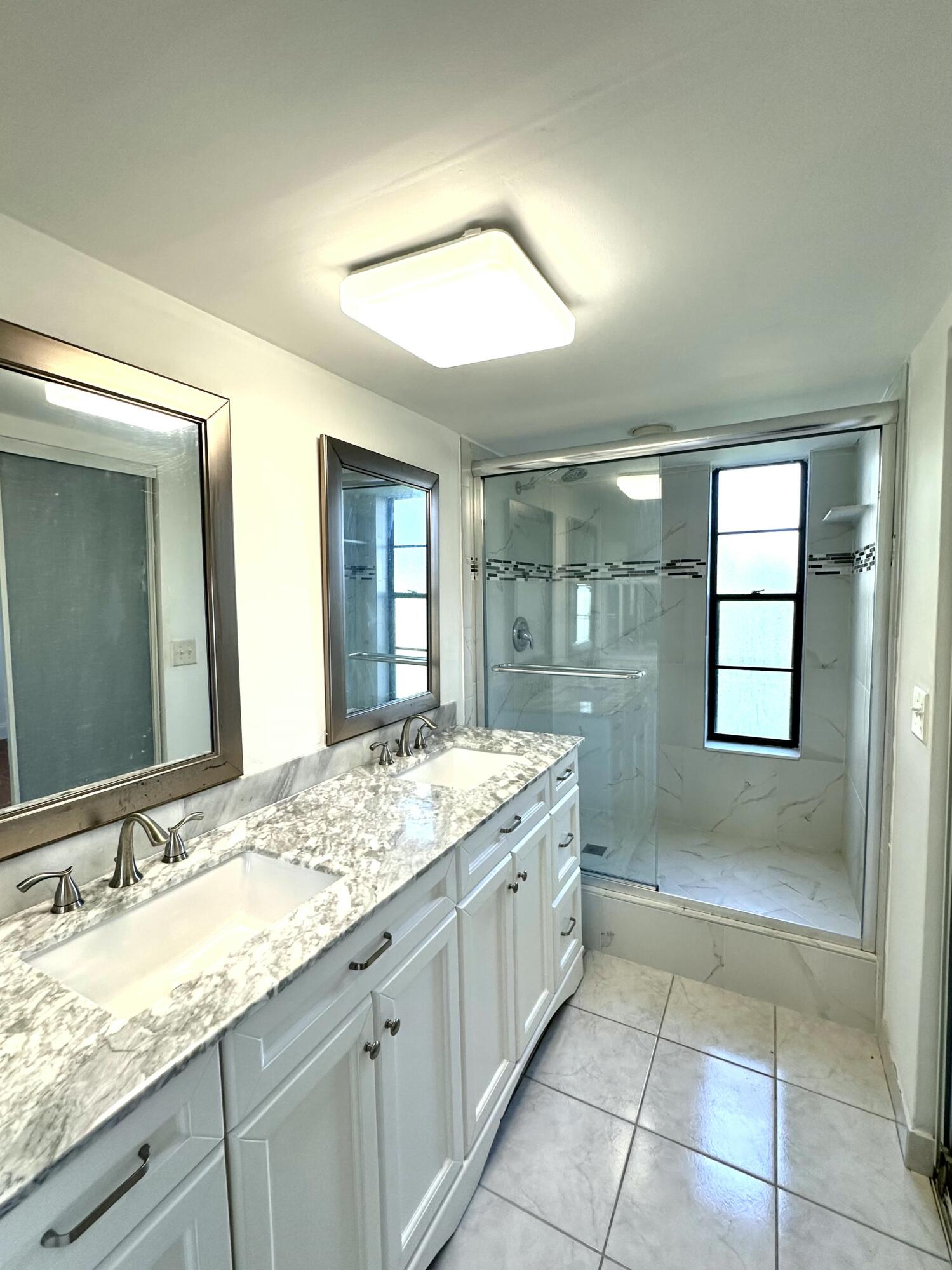 9235 Southwest 8th Street, Unit 306 Boca Raton, FL 33428 - Photo 9 of 27 Primary Bathroom