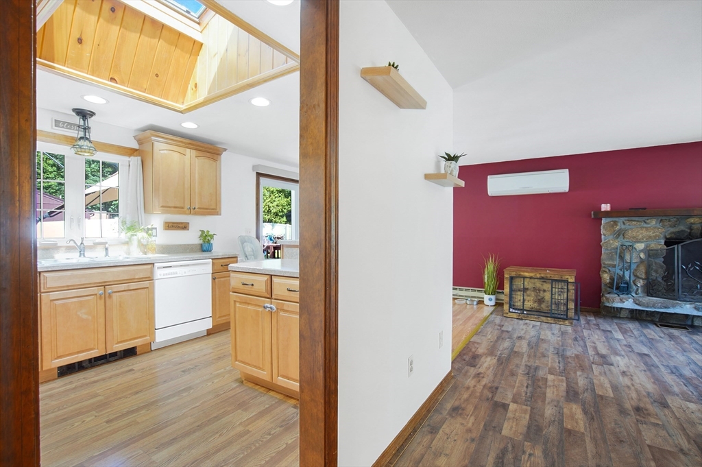 17 Beach Road Ware, MA 01082 - Photo 3 of 41 a kitchen with a refrigerator and a stove