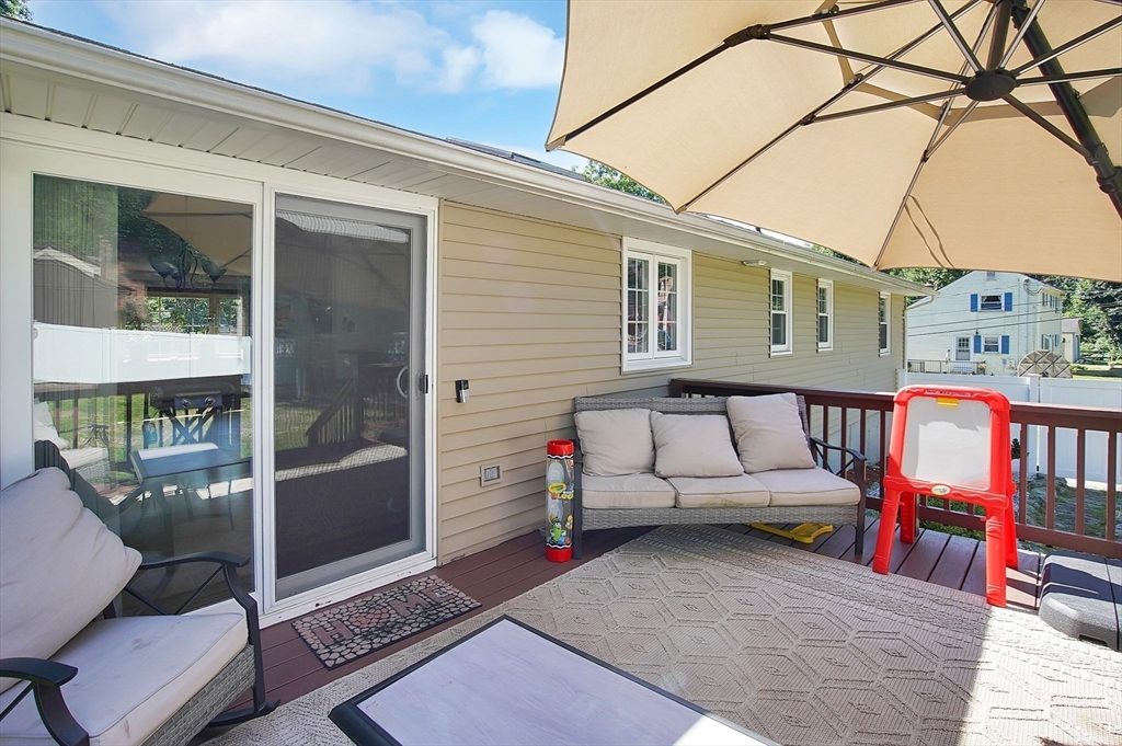 17 Beach Road Ware, MA 01082 - Photo 36 of 41 a backyard of a house with sofas table and sofas