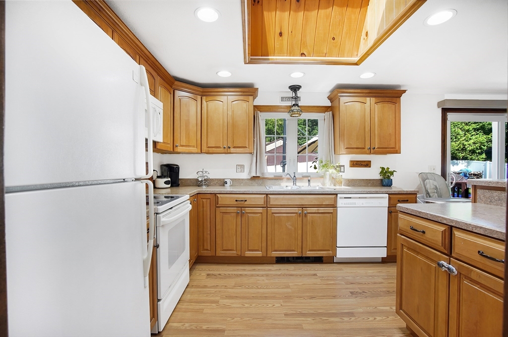 17 Beach Road Ware, MA 01082 - Photo 4 of 41 a kitchen with a sink appliances cabinets and a large window