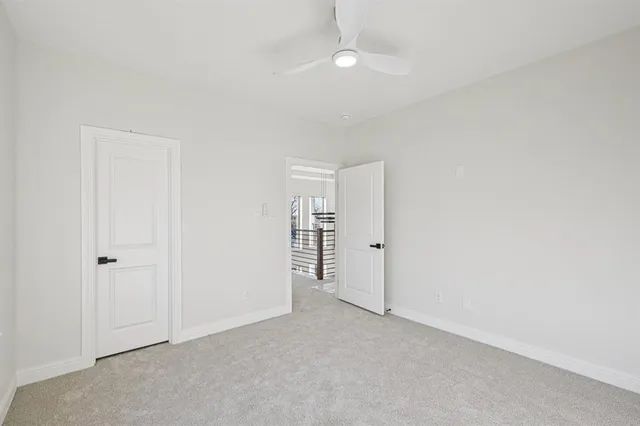 an empty room with a bathroom