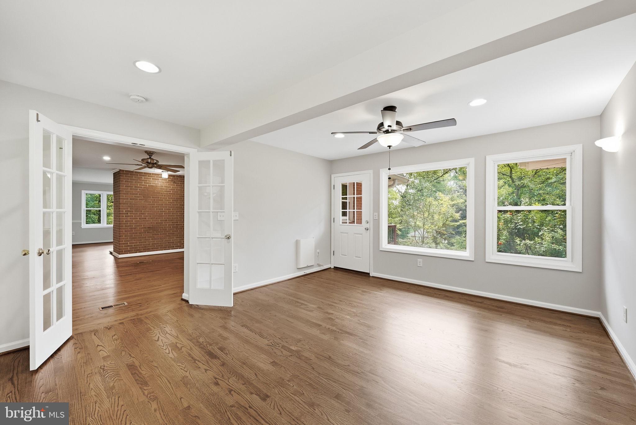 9425 Emory Grove Road Gaithersburg, MD 20877 - Photo 14 of 47 Sunroom addition with lighting and fan