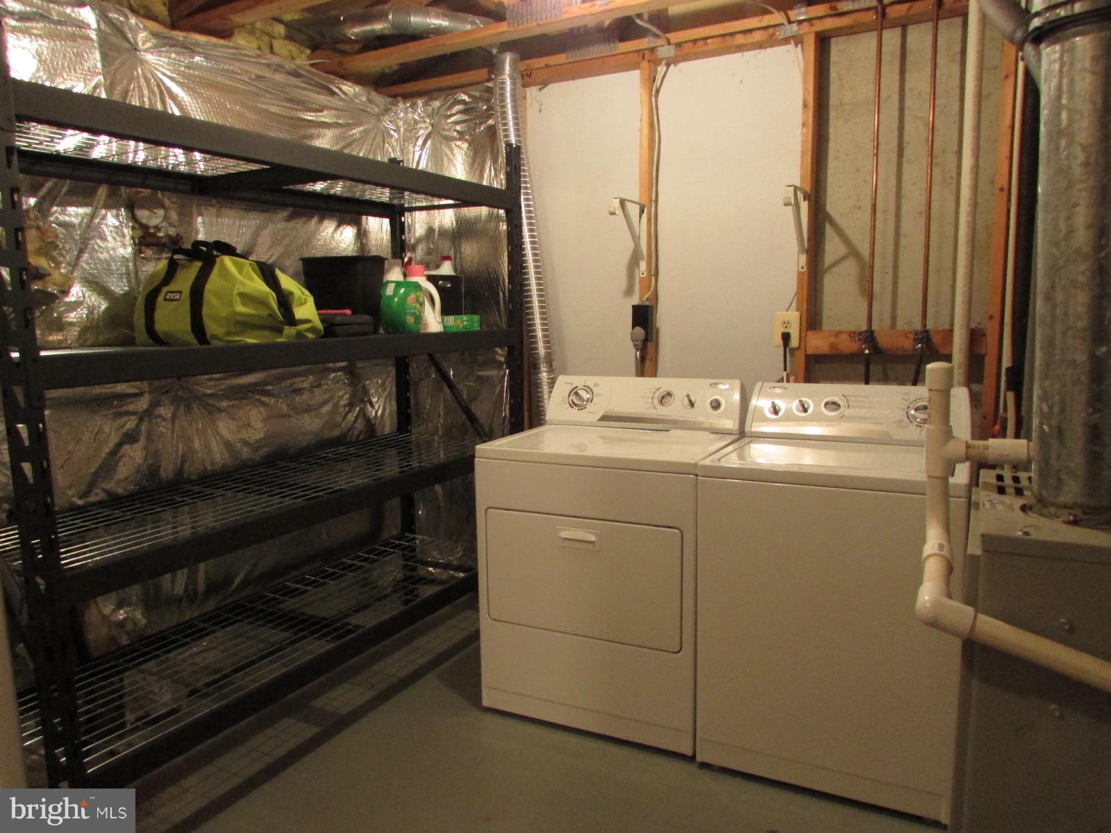 571 Quaker Ridge Court Arnold, MD 21012 - Photo 13 of 17 a utility room with dryer and washer