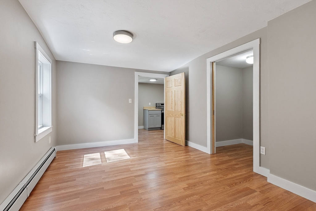 34 Morse Road Royalston, MA 01368 - Photo 35 of 42 a view of livingroom with wooden floor and window