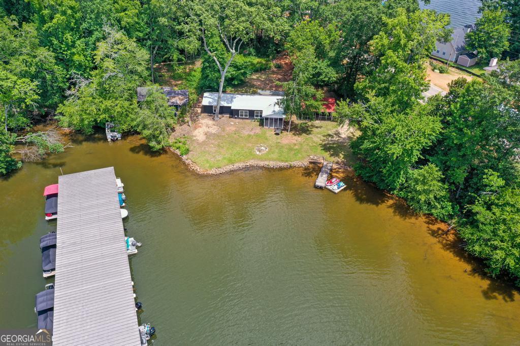 10685 Highway 212 Covington, GA 30014 - Photo 3 of 33 a view of an ocean house swimming pool and outdoor space
