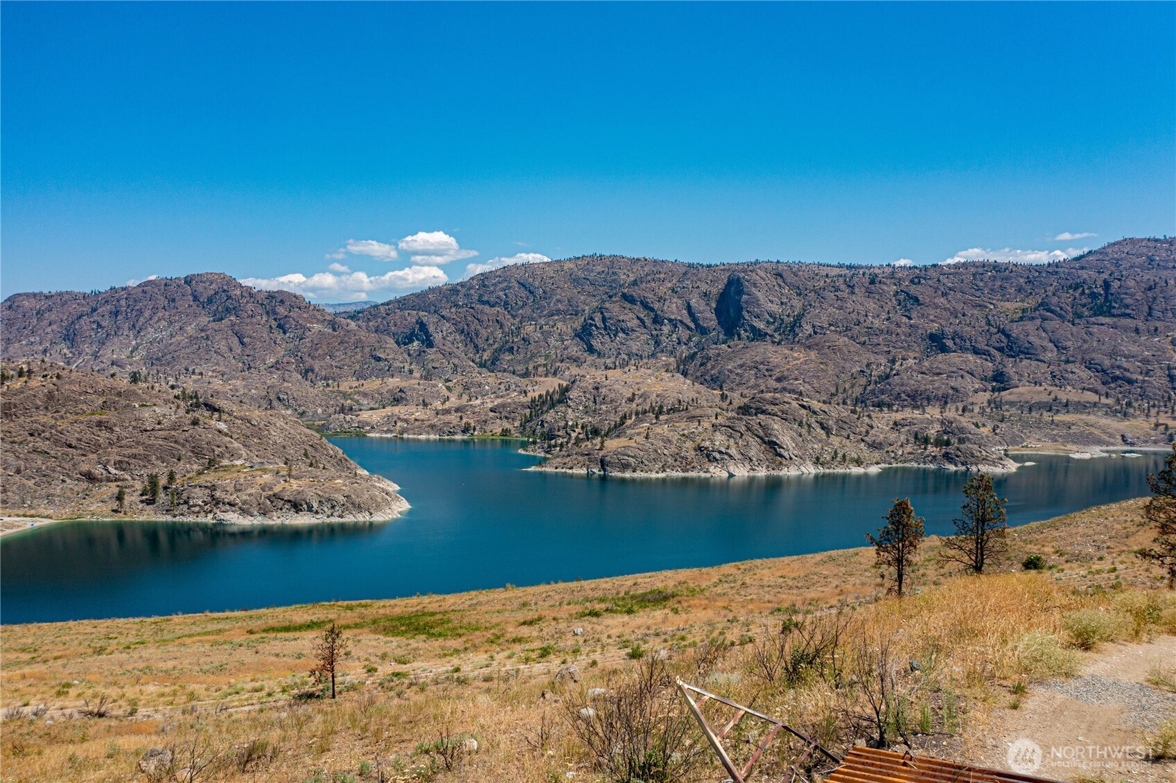 10 Omak Lake Road Okanogan, WA 98840 - Photo 5 of 6 a view of a lake with mountain