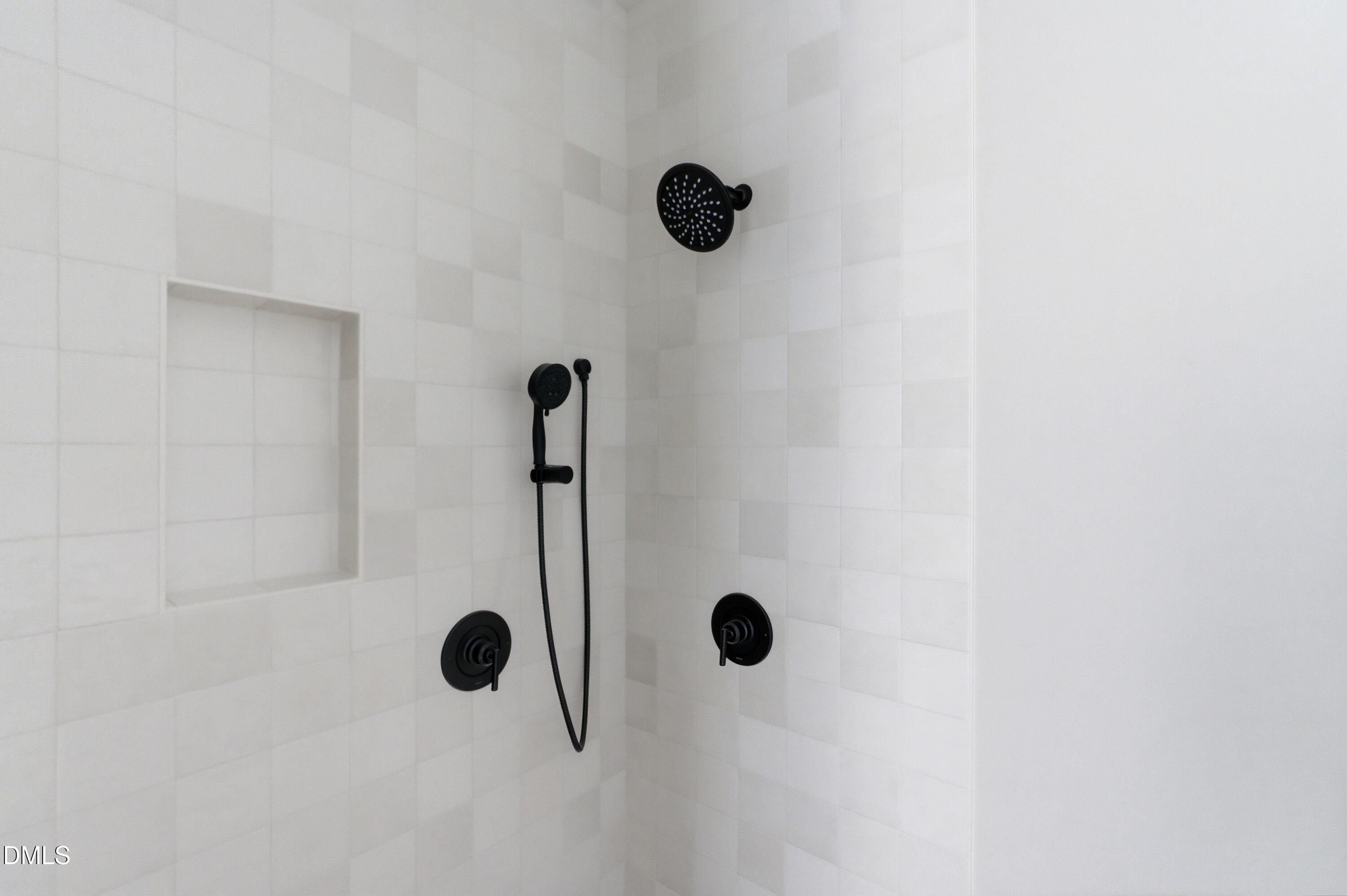 720 Noble Town Way, Unit 104 Raleigh, NC 27603 - Photo 13 of 21 a bathroom with a shower