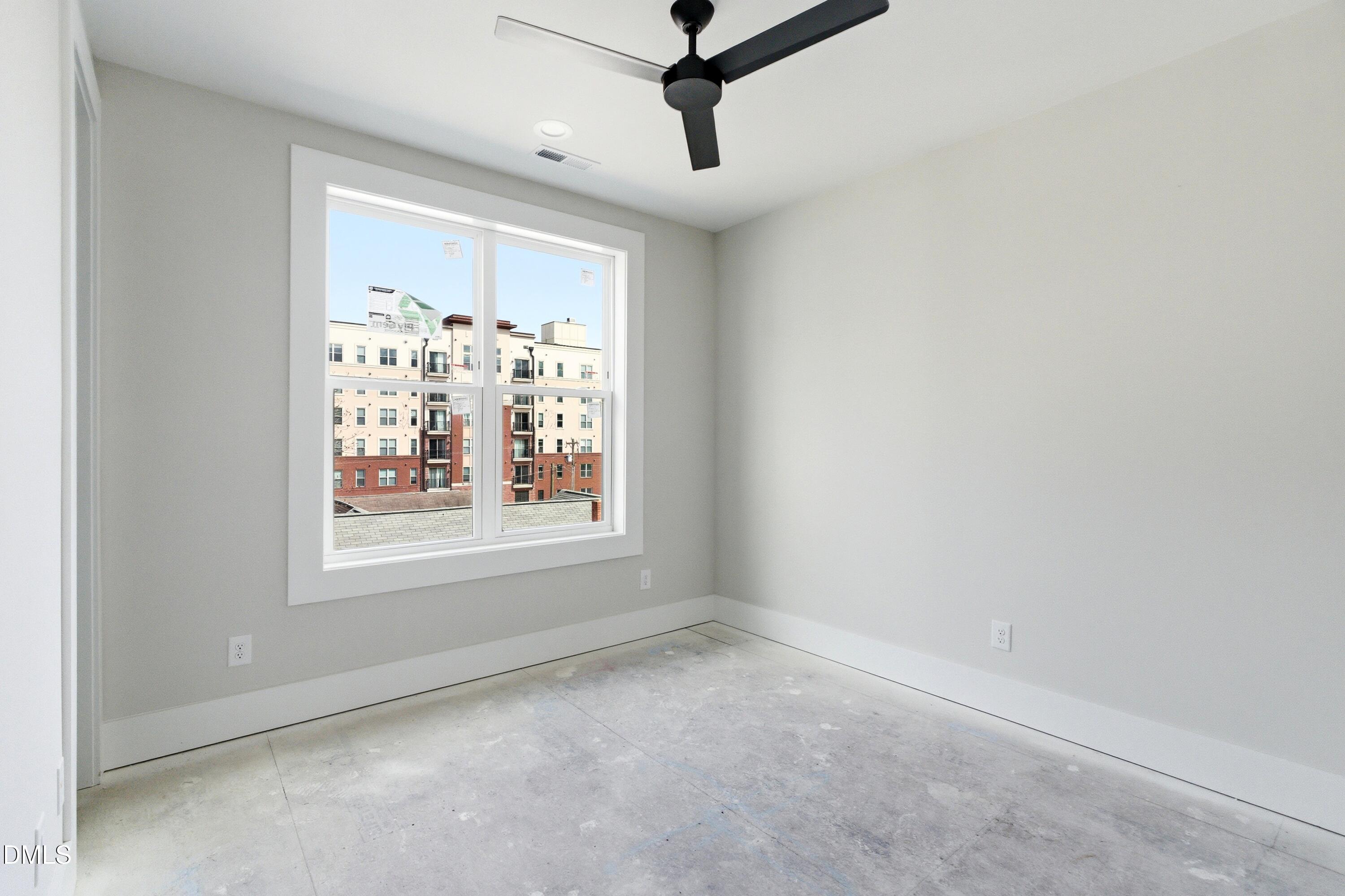 720 Noble Town Way, Unit 104 Raleigh, NC 27603 - Photo 15 of 21 a view of a room with window and ceiling fan