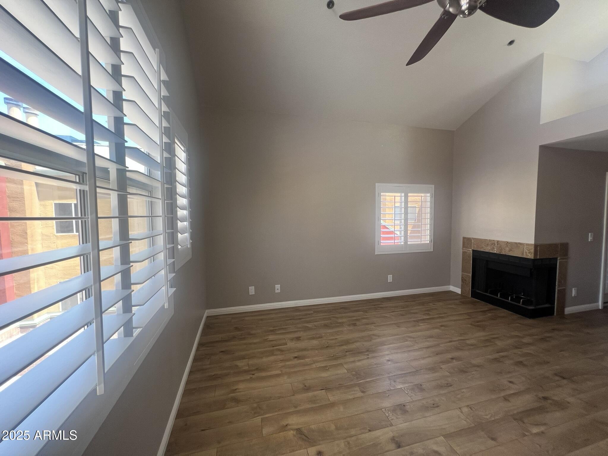 154 West 5th Street, Unit 248 Tempe, AZ 85281 - Photo 6 of 18 a view of an empty room with a window and fire place