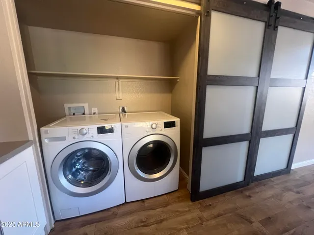 a utility room with dryer and washer