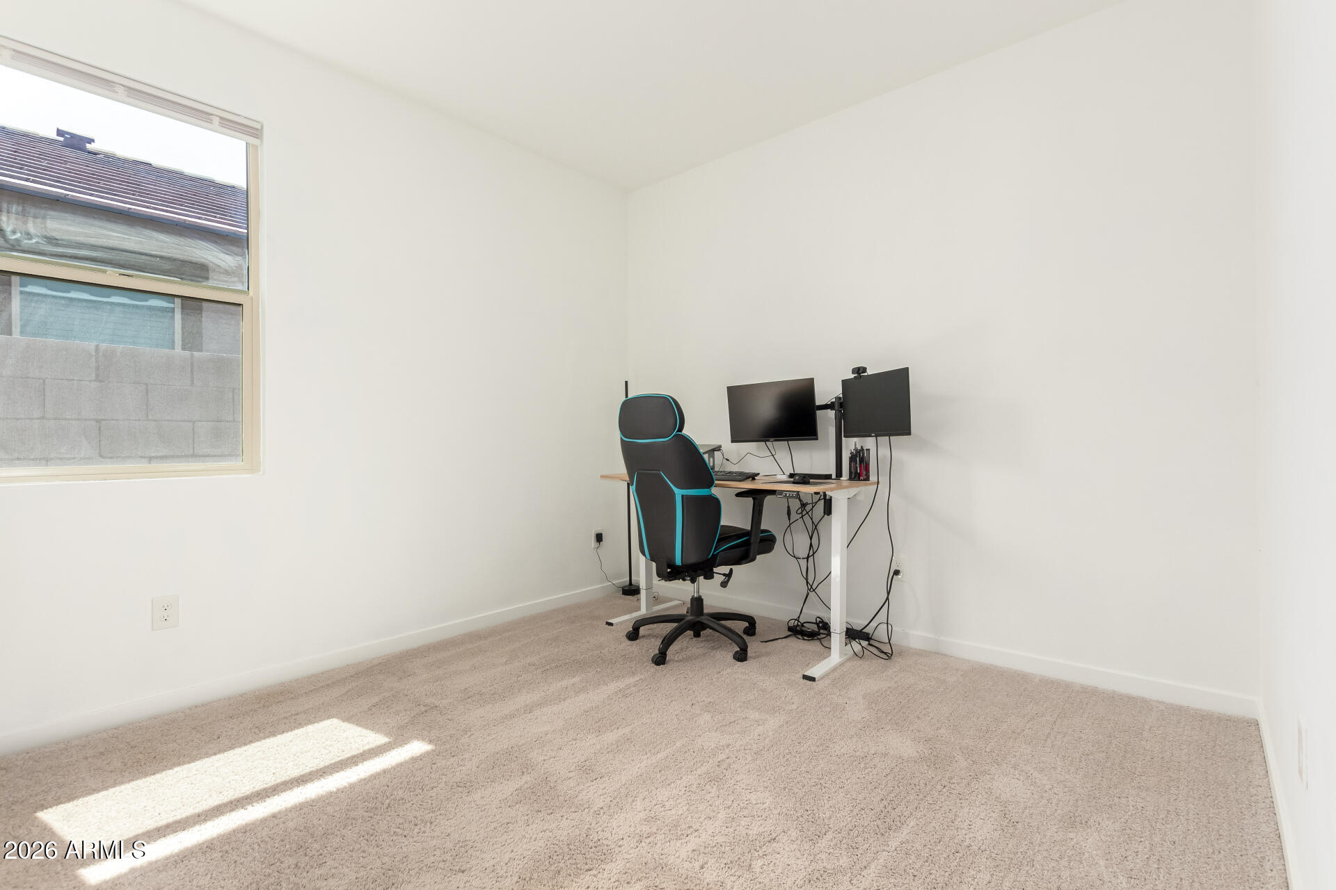 39985 West Rio Lobo Drive Maricopa, AZ 85138 - Photo 19 of 44 a view of workspace with windows