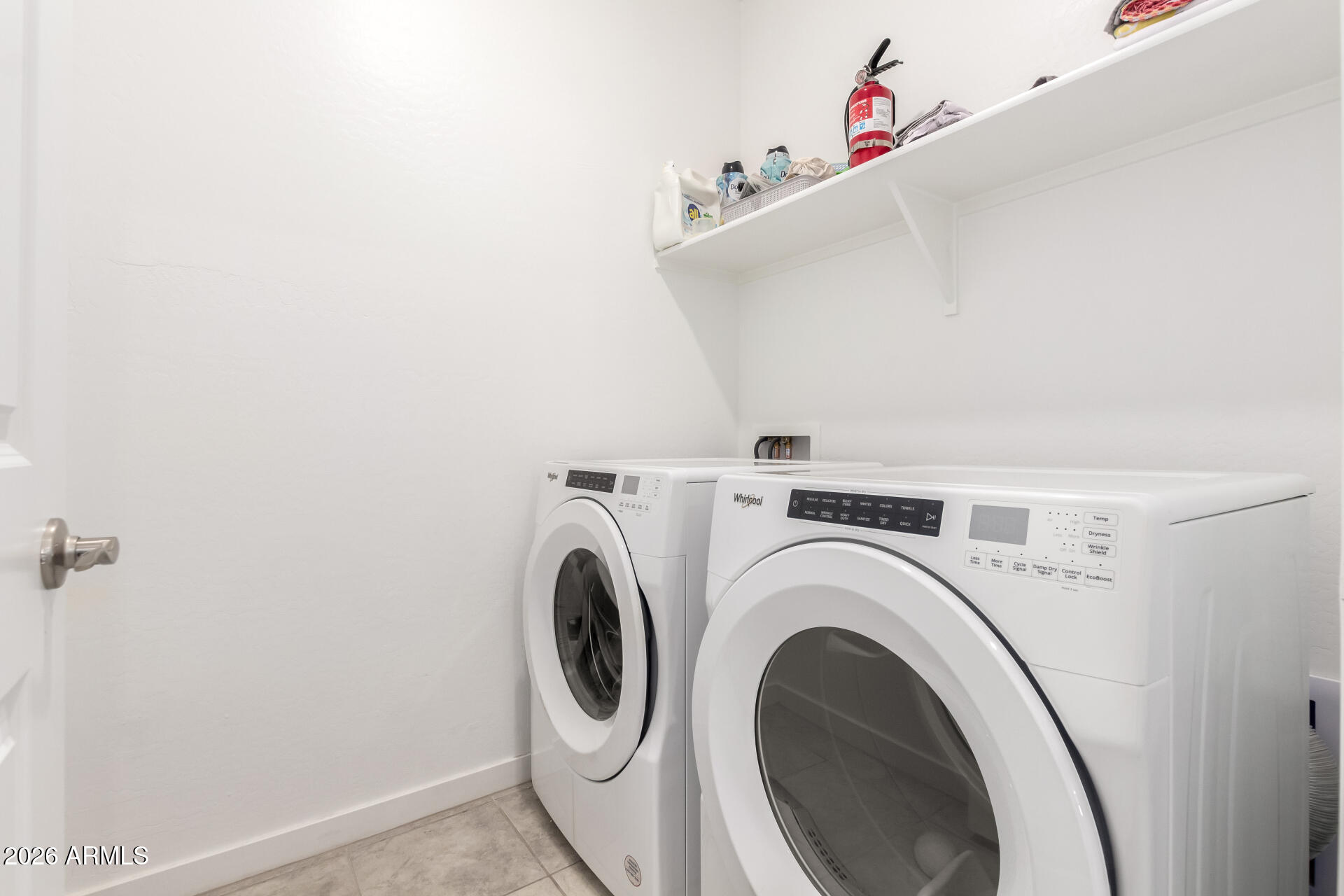 39985 West Rio Lobo Drive Maricopa, AZ 85138 - Photo 22 of 44 a utility room with dryer and washer