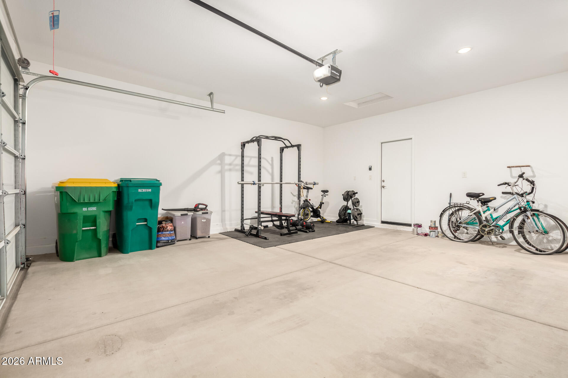 39985 West Rio Lobo Drive Maricopa, AZ 85138 - Photo 24 of 44 a view of a room with furniture and a chandelier