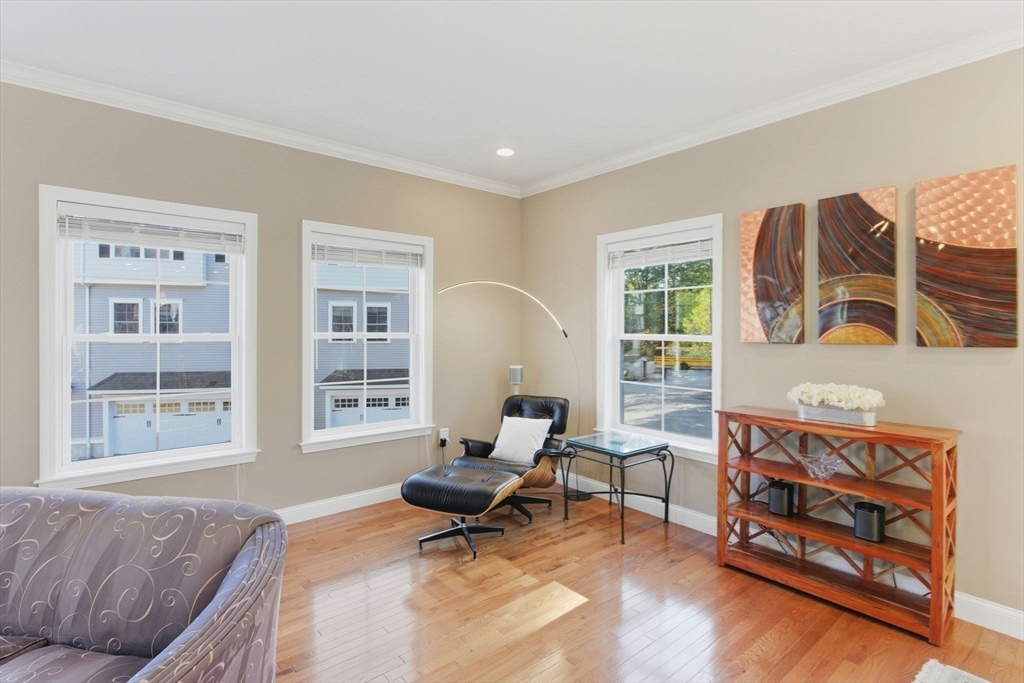 66 Compass Point, Unit 66 North Andover, MA 01845 - Photo 27 of 42 a living room with furniture and a window