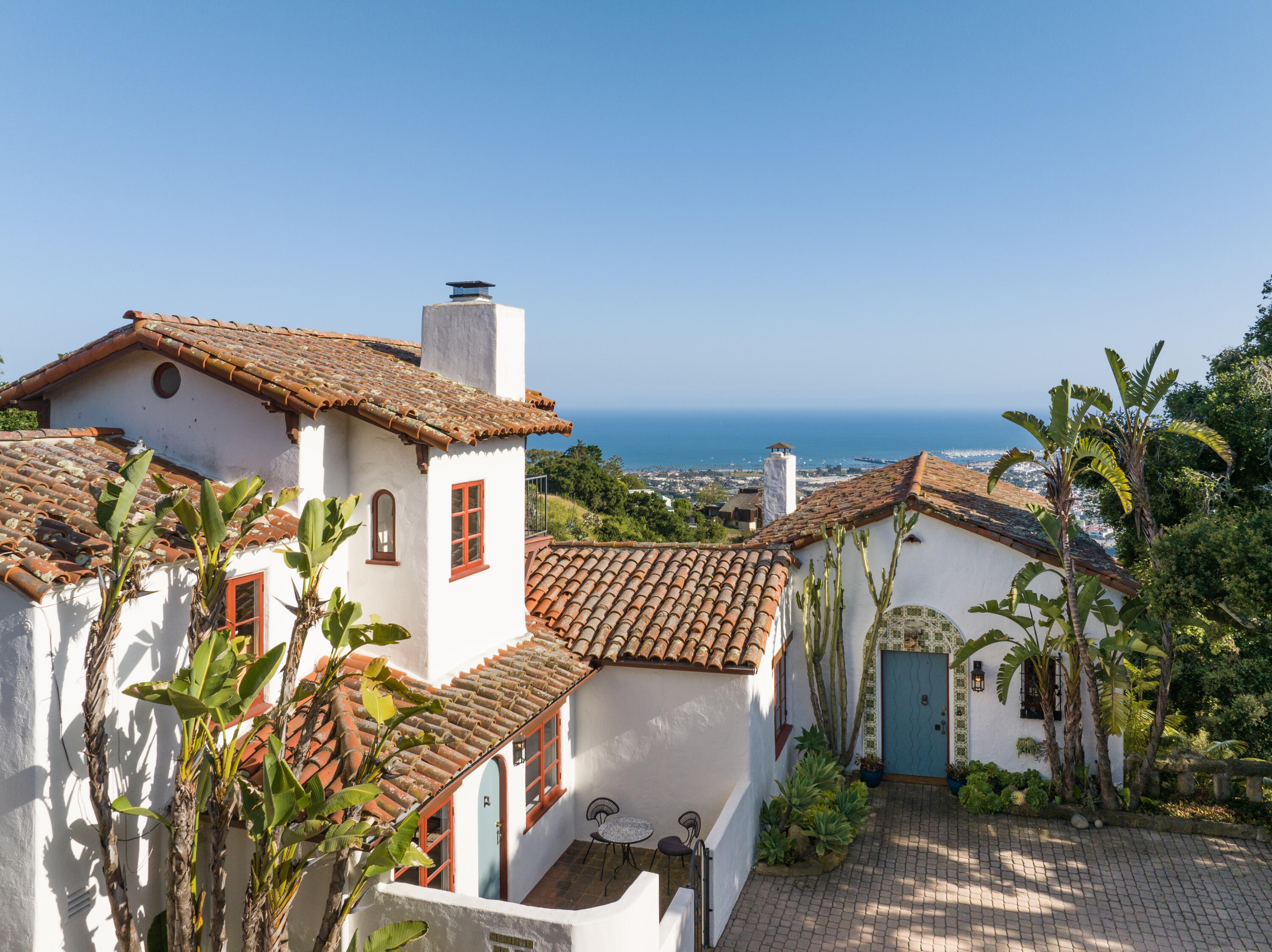 1121 Las Alturas Road Santa Barbara, CA 93103 - Photo 1 of 1 a front view of a house with a yard