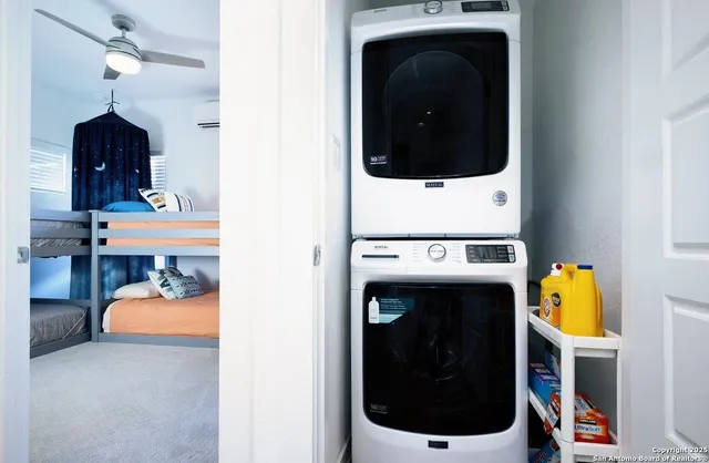 a utility room with dryer and washer