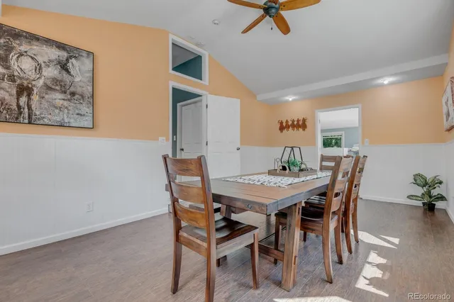 a view of a dining room with furniture
