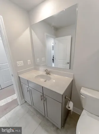 a bathroom with a sink and a toilet