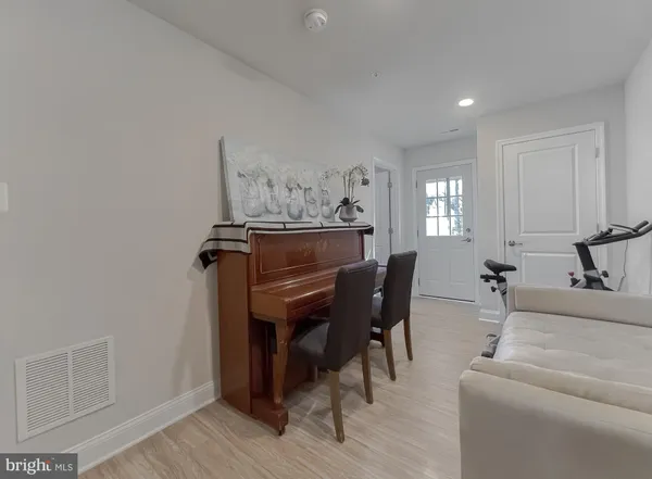 a view of a livingroom with furniture and window