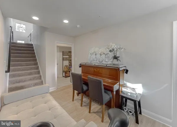 a bedroom with a bed and furniture