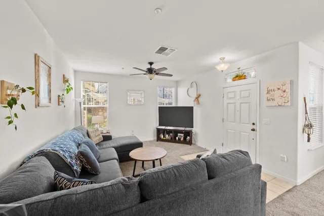 a kitchen with stainless steel appliances granite countertop a sink and stove