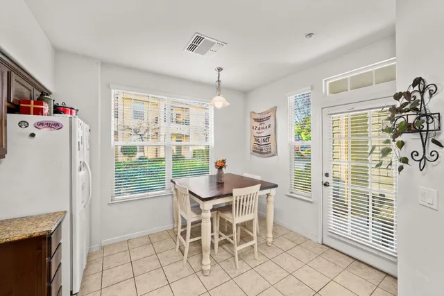 an aerial view of a house with outdoor space